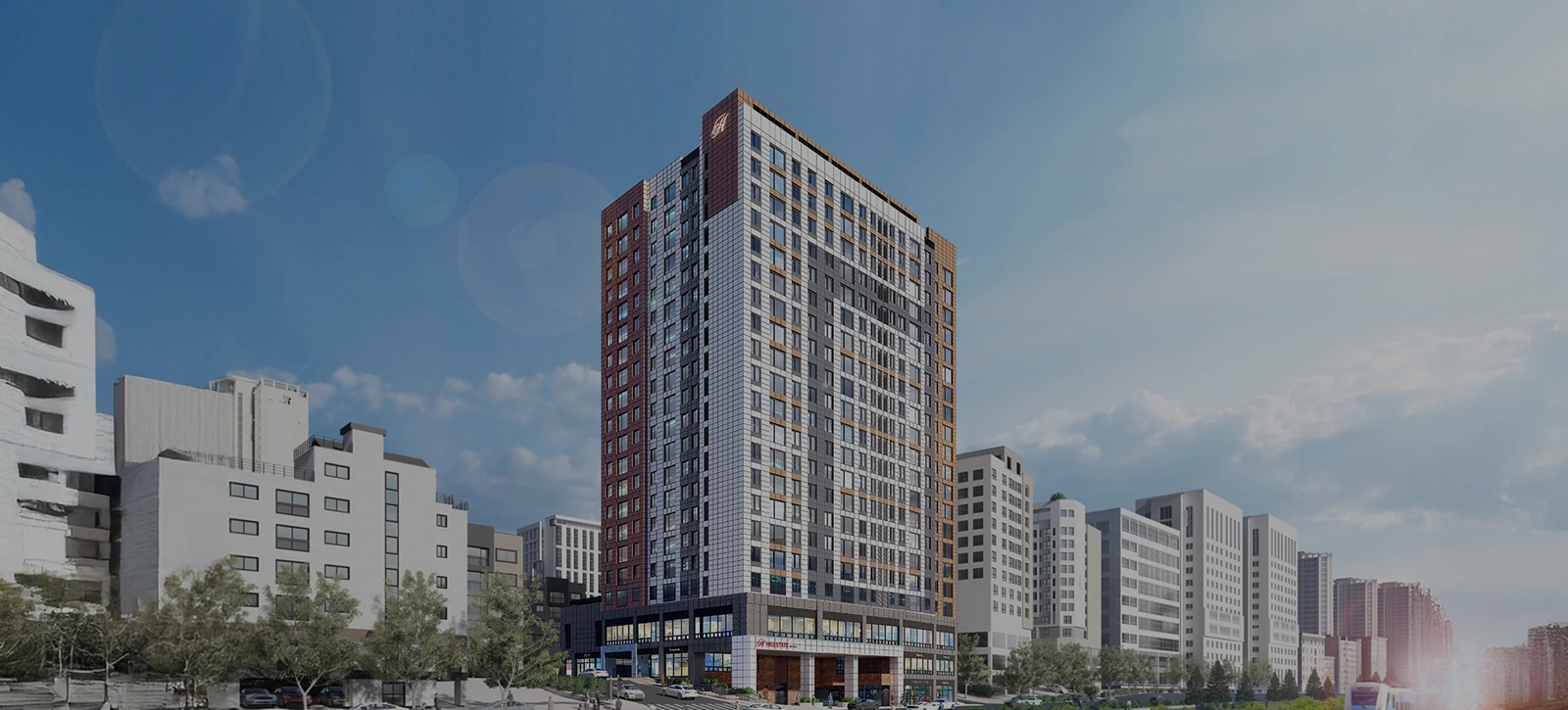 힐스테이트 안양펠루스 회색 격자 외벽과 적갈색 코너가 있는 단일 고층 주동 외관